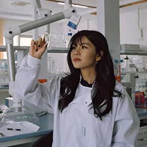 YoungAsianFemaleScienceResearcherHoldingVial_300x300_Q50 Young Asian Female Science Researcher Holding Vial